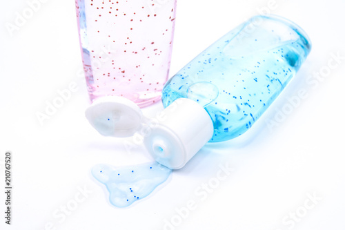 Bottles of  lotion containing microplastics. Microplastics has been deemed environmentally harmful and has been banned from used in some countries. photo