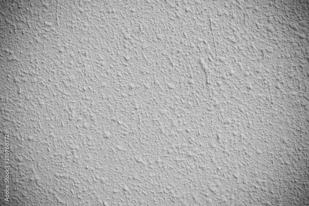 Concrete texture background for background in black and soft vignette, grey and white colors and solid point.