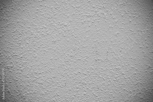 Concrete texture background for background in black and soft vignette, grey and white colors and solid point.