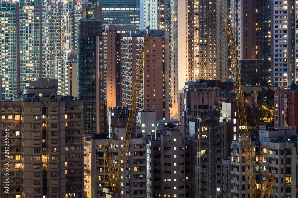 Very high density of apartment towers in the Happy Valley district of Hong Kong island at night in China SAR.