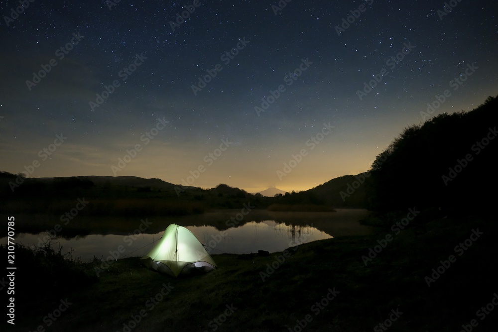 Obraz premium Starry Night On Wild Camp By The Lake, Sicily