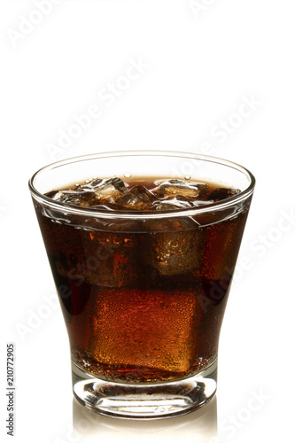 Cola in glass with ice on white background