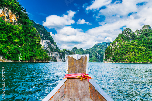 Wooden Thai boat on Ratchaprapha Dam at Khao Sok National Park