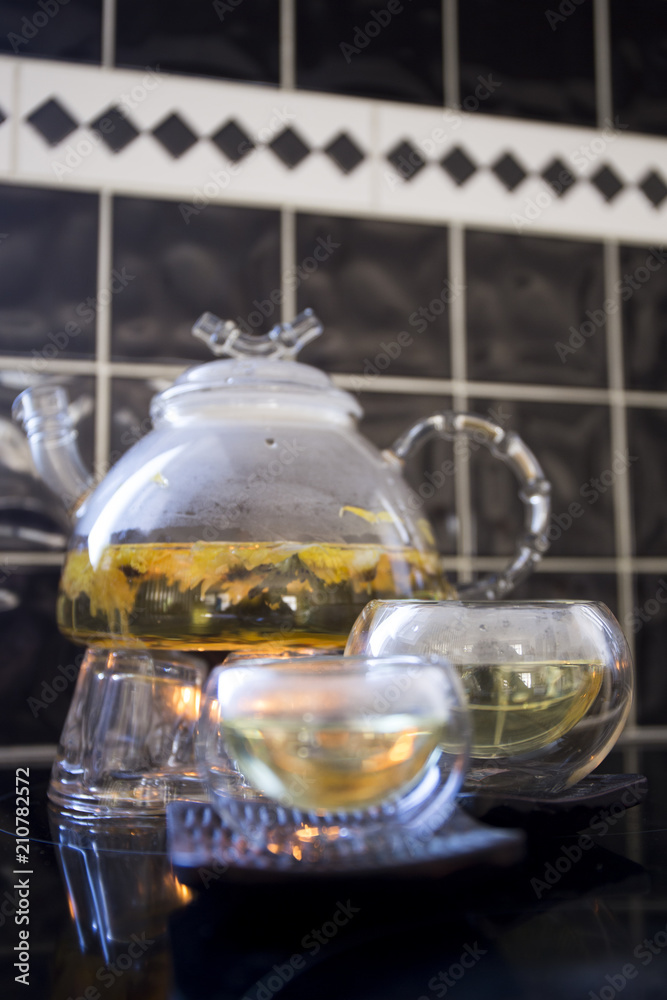 Blooming, Flowering Tea in Glass Teapot Blooming, Flowering Tea in Glass Teapot