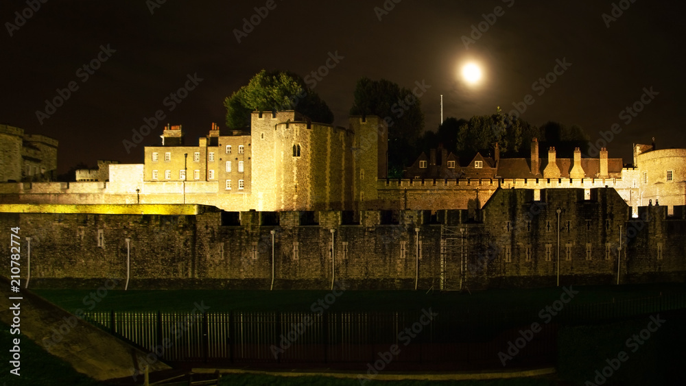 Tower of London, West Side Casemate shot in night, with full moon above.