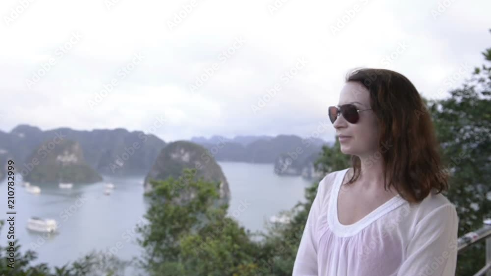 happy young woman tourist looking far away on sea and islands background happy young woman tourist looking far away on sea and islands background