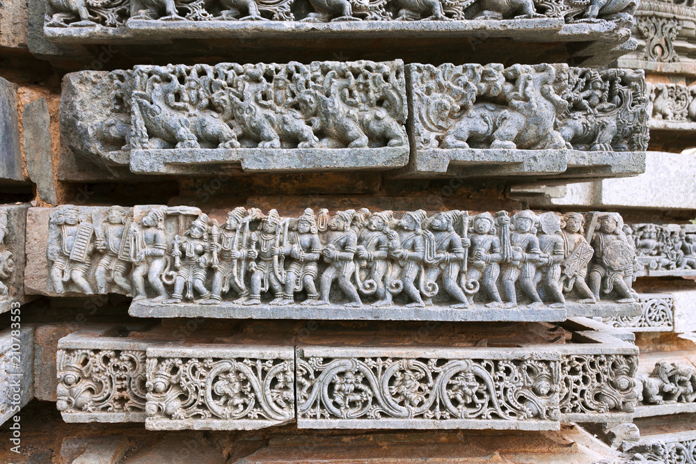 Episode from Ramayana. Rama, Sita and Laxmana returning from Lanka. Kedareshwara temple, Halebidu, Karnataka