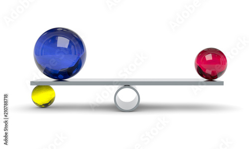 blue red and yellow ball on a scale