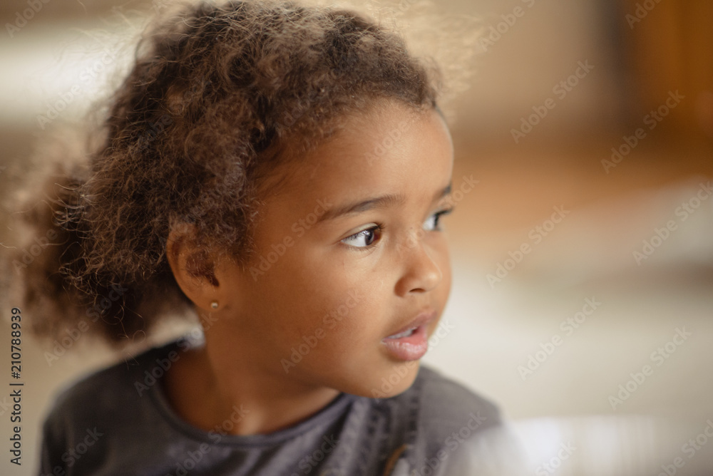 Happy Mixed Race Toddler Girl Stock Photo