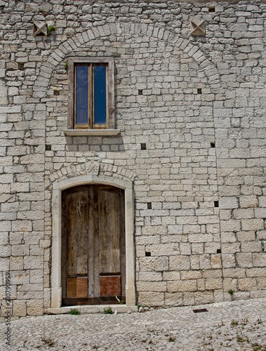 Medieval balcony and windows