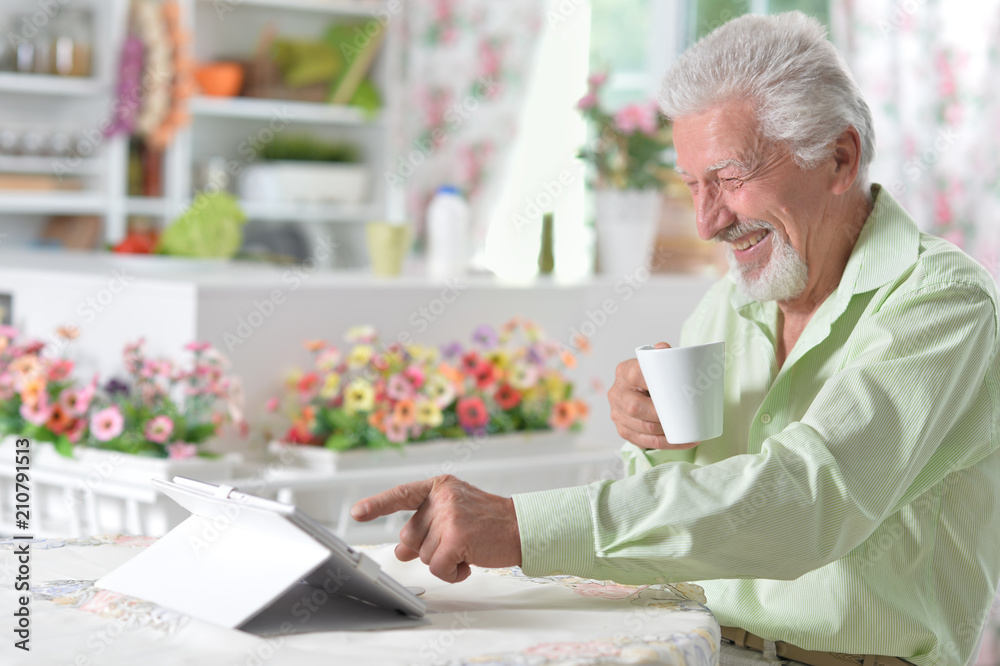 man using digital tablet man using digital tablet