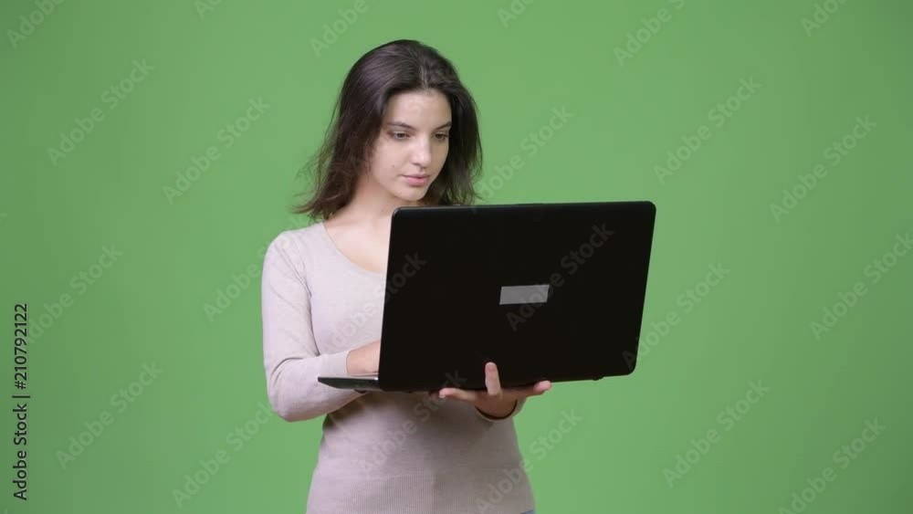 Young beautiful woman using laptop Young beautiful woman using laptop
