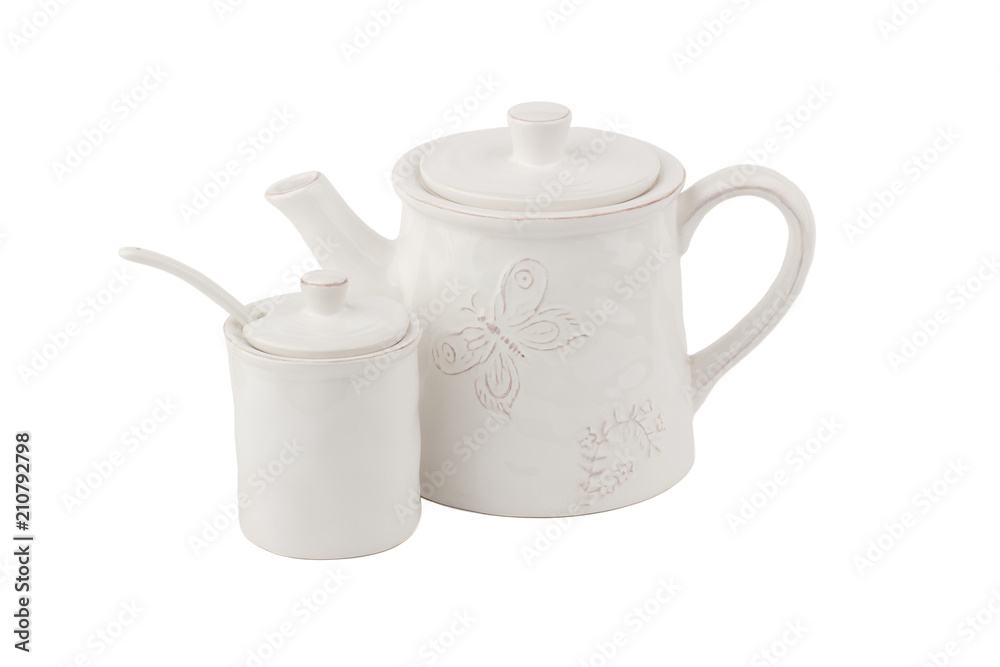 White ceramic teapot for coffee or tea and sugar bowl, white background White ceramic teapot for coffee or tea and sugar bowl, white background