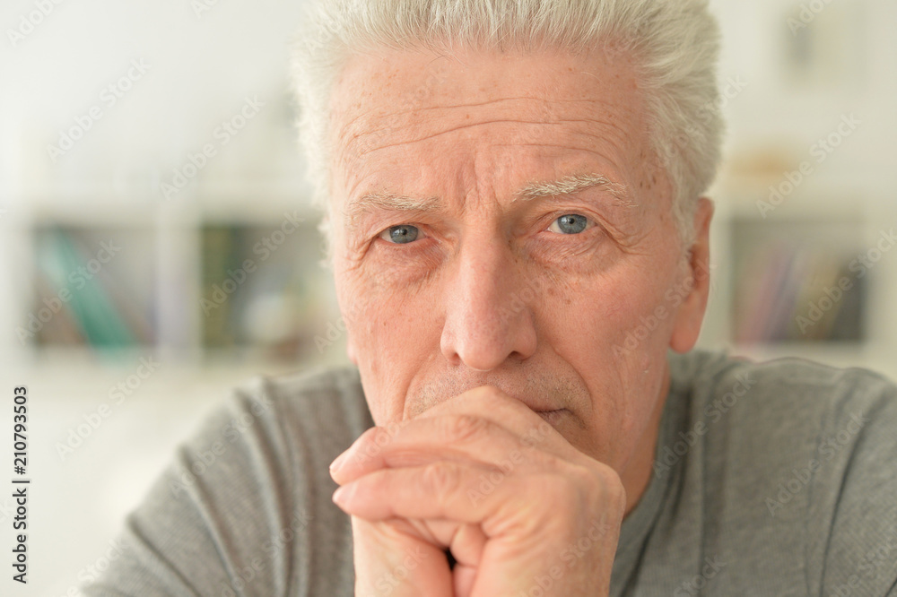 Portrait of Sad senior man at home Portrait of Sad senior man at home
