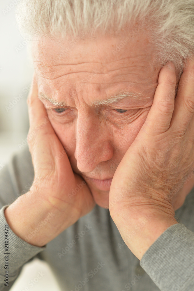 Portrait of Sad senior man at home Portrait of Sad senior man at home