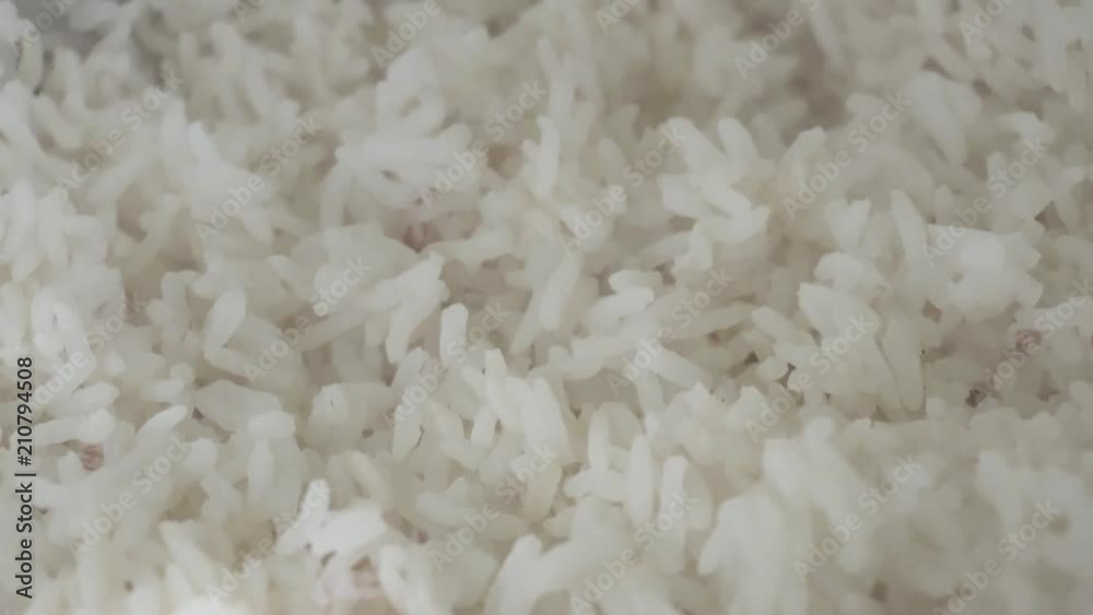 White rice with a slow movement of camera, with some soft light White rice with a slow movement of camera, with some soft light