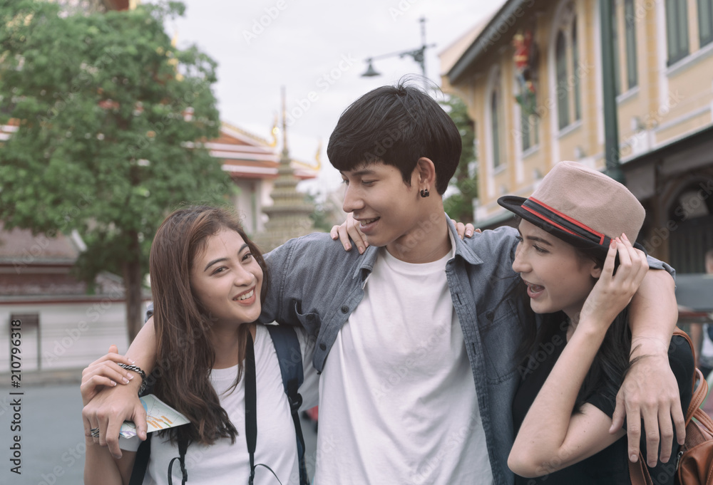 Group of tourist backpacker friends traveling in Bangkok,Thailand Group of tourist backpacker friends traveling in Bangkok,Thailand