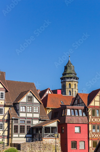 Church tower and old houses in Hannoversch Munden, Germany