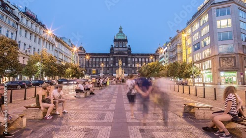 Hyperlapse time lapse sequence on charles bridge in Prague from day to night photo