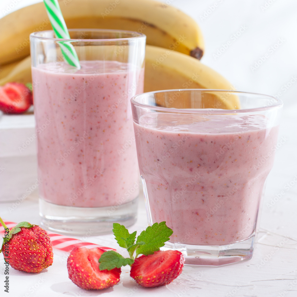 Strawberry and banana smoothie in the jar,square Strawberry and banana smoothie in the jar,square