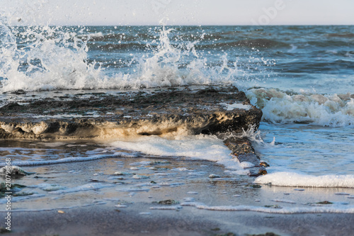 Fototapeta Naklejka Na Ścianę i Meble -  sea wave covers the stone, black sea
