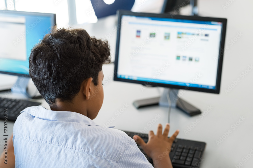 Young boy using computer Young boy using computer
