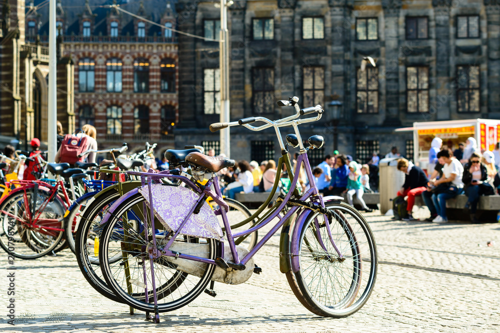 Bicycles parked on the city street in Amsterdam, The Netherlands