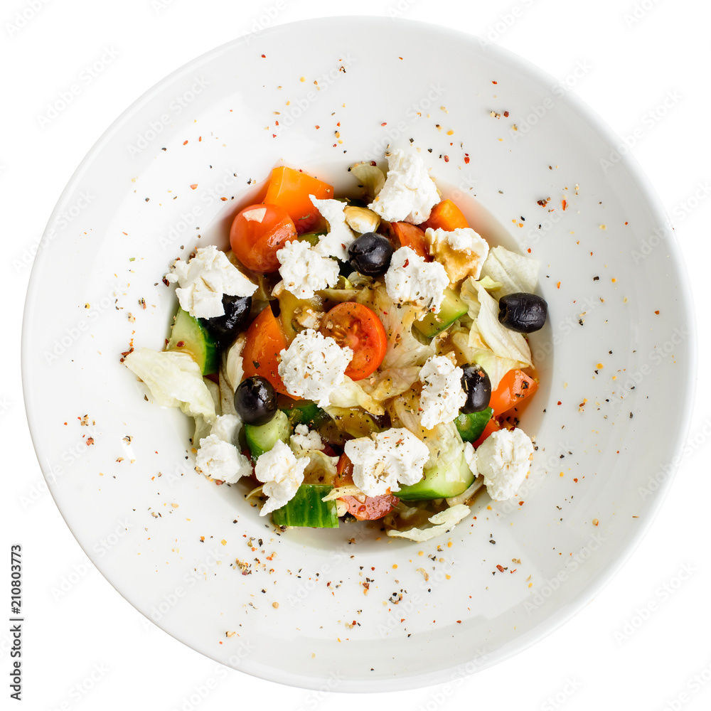 Appetizing vegetarian salad with feta cheese, tomatoes, cucumber Appetizing vegetarian salad with feta cheese, tomatoes, cucumber