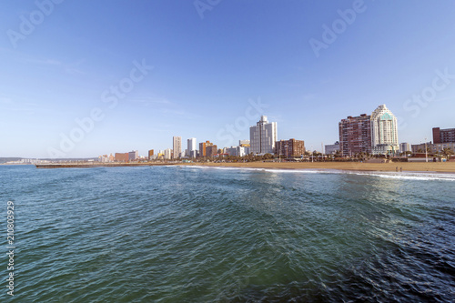 Ocean and Beach Against City Skyline Durban South Africa