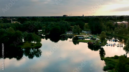 The Netherlands – Aerial drone view over Gaasperplas, Amsterdam South East with sunset sky photo