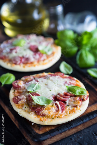 Mini pizzas with pepperoni and cheese