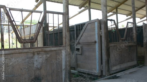 The old stable building at an abandoned ranch. Old interior. photo