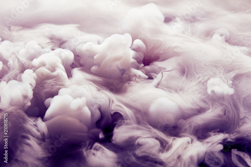 Abstract background of clouds made of smoke from dry ice in color pink