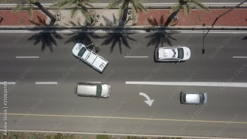 Road block - Aerial footage of Two Police cars blocking two left lanes ...