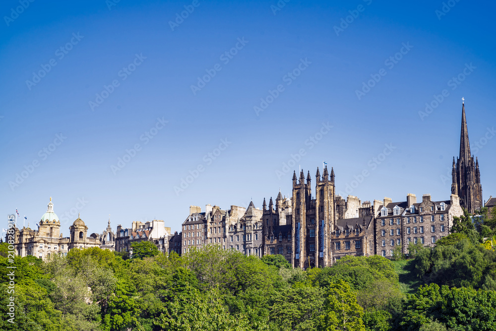 A view of Edinburgh Old Town, from Princes Street.  Buildings left to right, Original head office of the Bank of Scotland, General Assembly Hall of Church of Scotland, Tron Kirk spire.