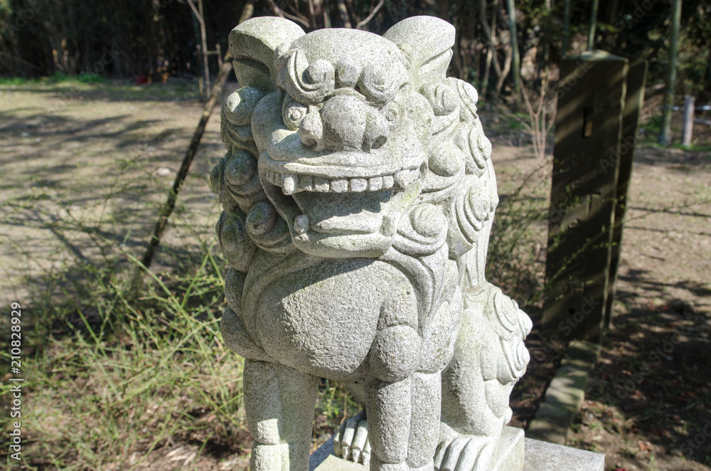 Close-up of stone lion-dog sculpture
