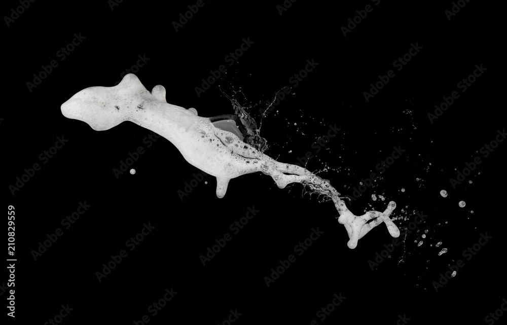 White bubble foam splash explosion in the air on black background,freeze stop motion photo object design