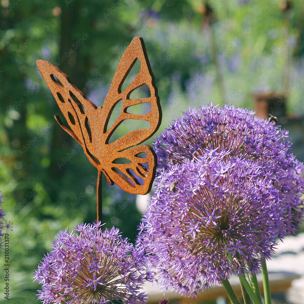 Naklejka premium Iron decoration on a flower bed