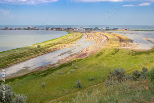 Beautiful meadow on the background of the sea.