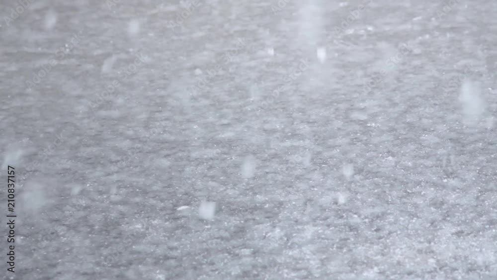 naked ice. snow falls to the ground. the beginning of the winter season naked ice. snow falls to the ground. the beginning of the winter season