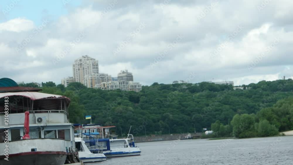 The parking of boats on the mooring on Dnieper River, Kiev, Ukraine, time lapse The parking of boats on the mooring on Dnieper River, Kiev, Ukraine, time lapse
