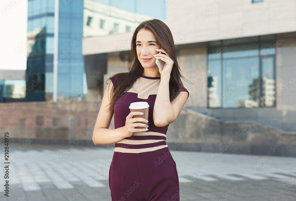 Portrait of a confident young businesswoman talking on cell Portrait of a confident young businesswoman talking on cell