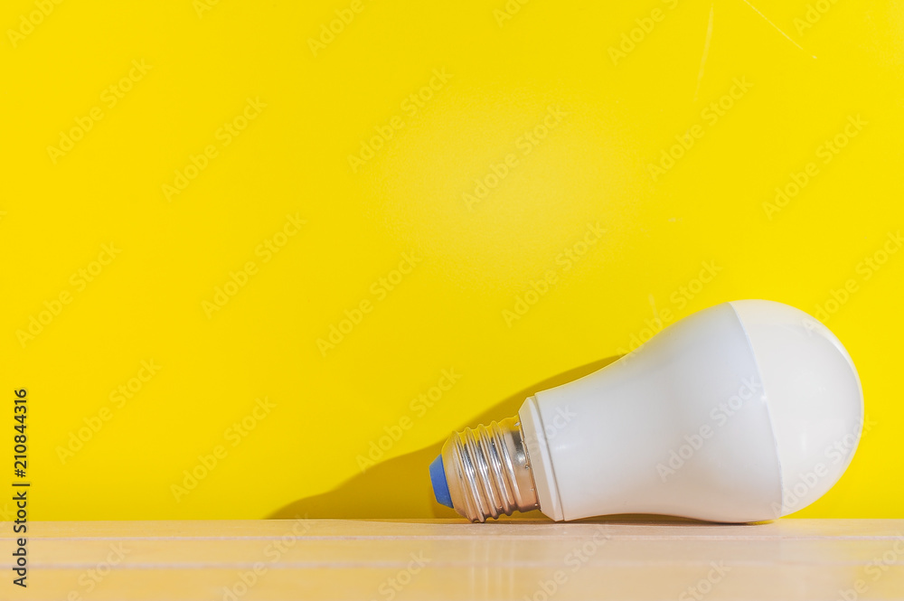 Light bulb on yellow background with copy space.Bright and fresh idea concept. Light bulb on yellow background with copy space.Bright and fresh idea concept.