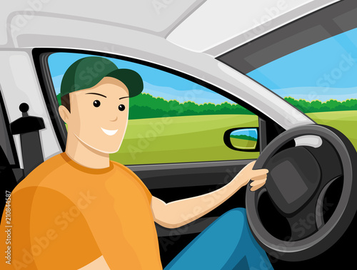 Cheerful driver in a cap sits in the car.