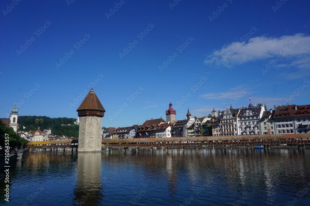 Water tower in Switzerland town at a lake