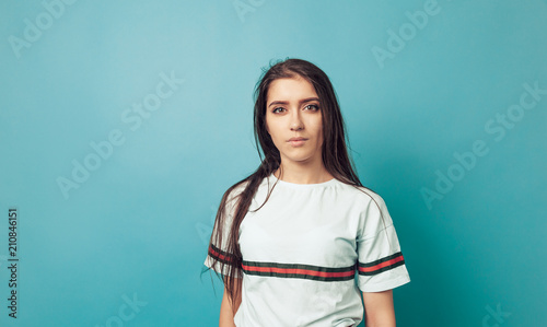 Girl  portrait on cyan background studio woman blue 