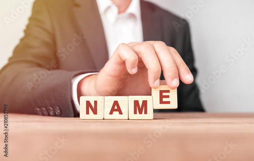 Man made word NAME with wood blocks photo
