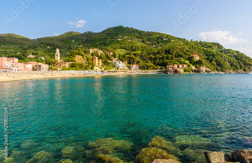 Fototapeta Naklejka Na Ścianę i Meble -  Levanto - town in Liguria, close to Cinque Terre in Italy. Scenic Mediterranean riviera coast. Historical Old Town with colorful houses and sand beach at beautiful coast of Italy.