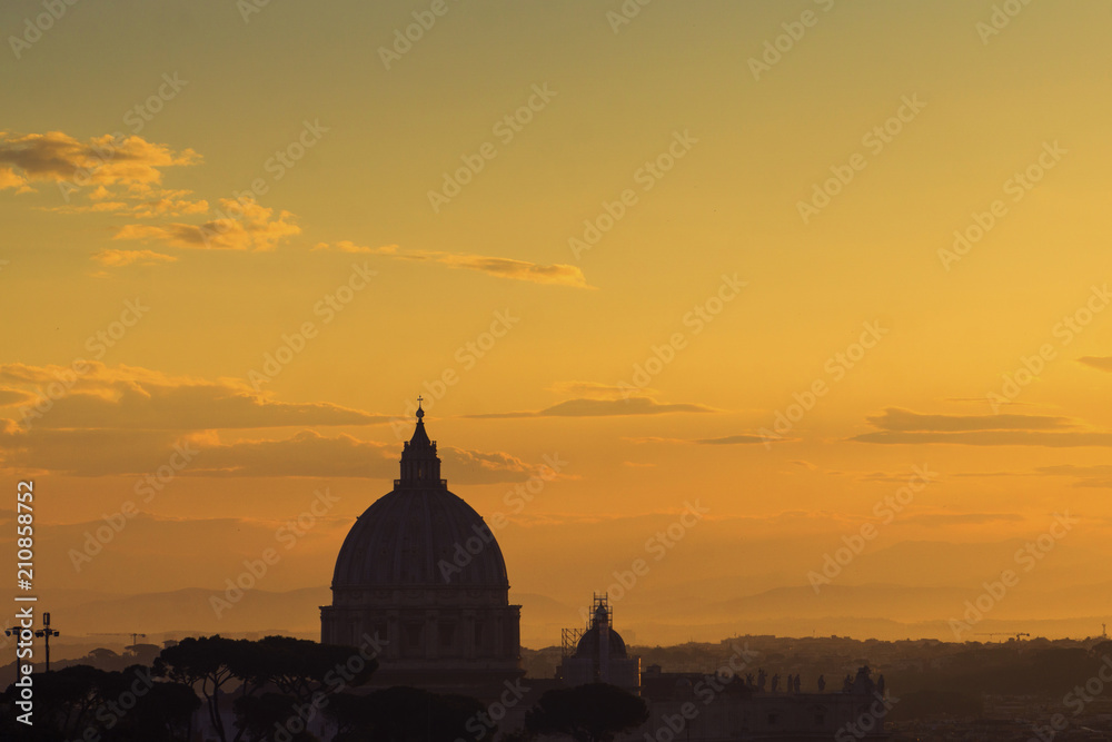 Obraz premium St Peter's basilica dome at sunrise in Rome, Italy