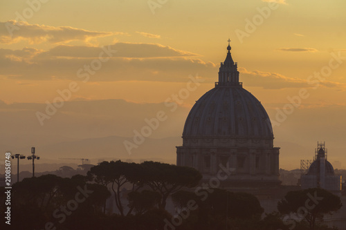 St Peter's basilica dome at sunrise in Rome, Italy